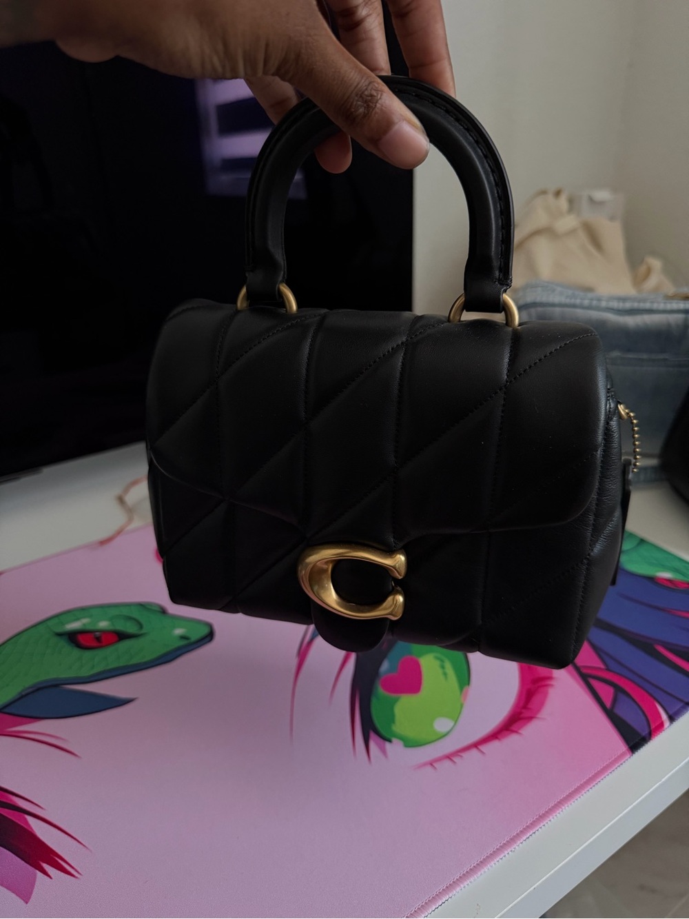 Black Quilted Tabby Top-Handle Bag with Gold Hardware